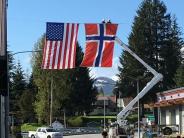 American and Norwegian flags over Main Street